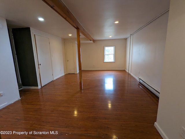 121 Sand St, Dunmore, PA 18510 - spare room with a baseboard heating unit, wood finished floors, and recessed lighting