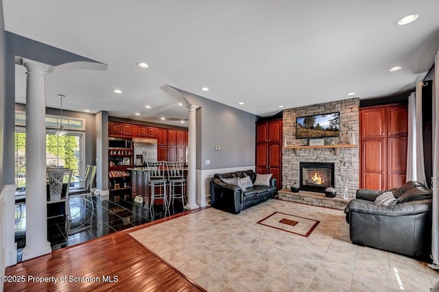 1015 Circle Green Dr Unit L 25, South Abington Twp, PA 18411 - living room featuring ornate columns, a fireplace, recessed lighting, and baseboards