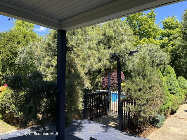 1015 Circle Green Dr Unit L 25, South Abington Twp, PA 18411 - deck with an outdoor pool