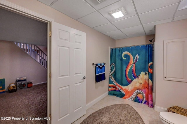 1015 Circle Green Dr Unit L 25, South Abington Twp, PA 18411 - bathroom featuring a paneled ceiling, toilet, a shower with curtain, and baseboards