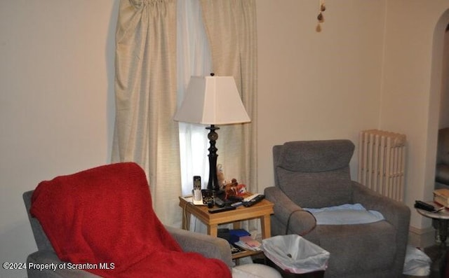 sitting room featuring radiator