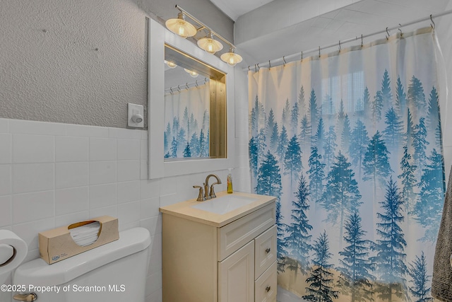 115 Marion St, Old Forge, PA 18518 - full bath with toilet, vanity, tile walls, and a shower with shower curtain