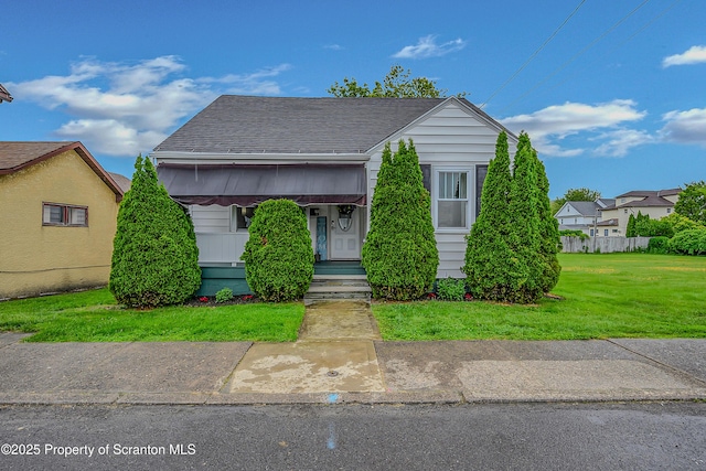 115 Marion St, Old Forge, PA 18518 - view of front of house with a front lawn and a shingled roof
