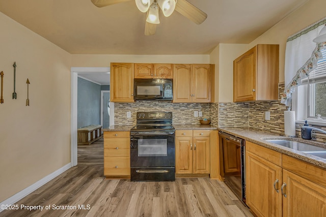 115 Marion St, Old Forge, PA 18518 - kitchen with black appliances, light wood-style flooring, tasteful backsplash, baseboards, and ceiling fan