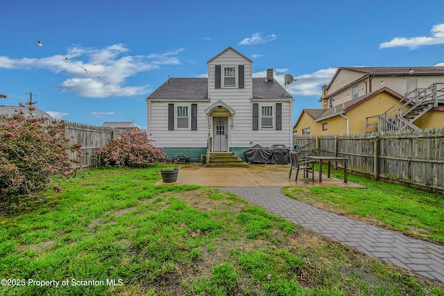 115 Marion St, Old Forge, PA 18518 - view of front facade with a patio area, entry steps, and a chimney