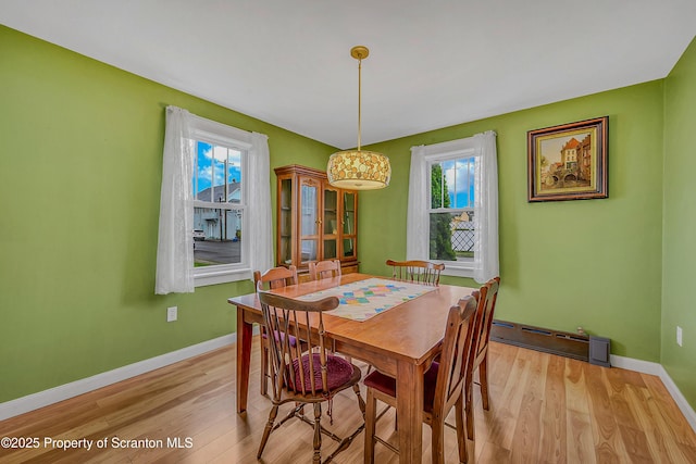 115 Marion St, Old Forge, PA 18518 - dining room with light wood-style floors and baseboards