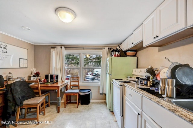 kitchen with white cabinetry, white electric range oven, and light stone counters