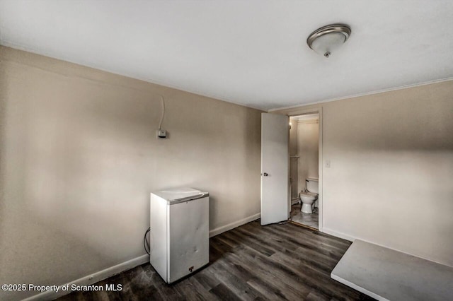 interior space with dark wood-type flooring