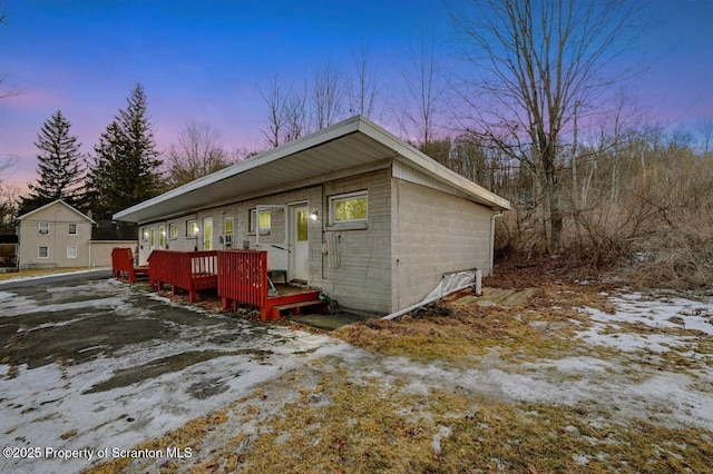 view of front of property with a deck