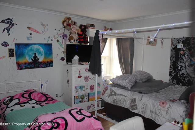 bedroom with wood finished floors