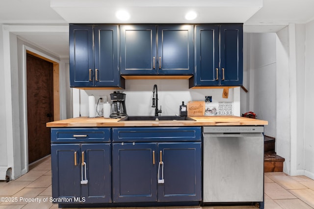 kitchen featuring blue cabinetry, dishwasher, and sink