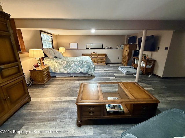 bedroom with wood-type flooring