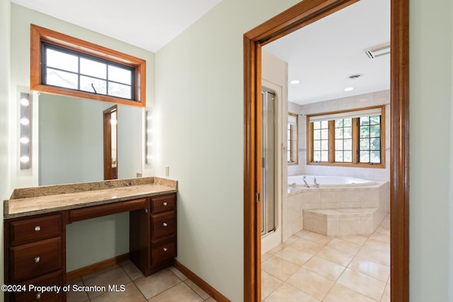 bathroom featuring vanity, tile patterned floors, and independent shower and bath