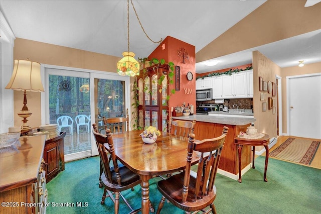 13 S Lehigh River Dr, Clifton Twp, PA 18424 - dining space with dark carpet and vaulted ceiling