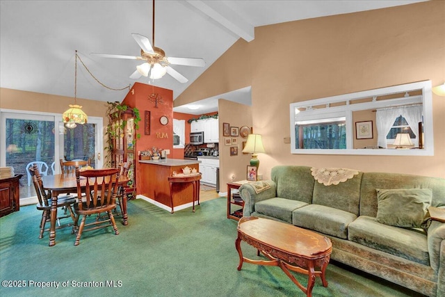 13 S Lehigh River Dr, Clifton Twp, PA 18424 - carpeted living room with a ceiling fan, beam ceiling, and high vaulted ceiling