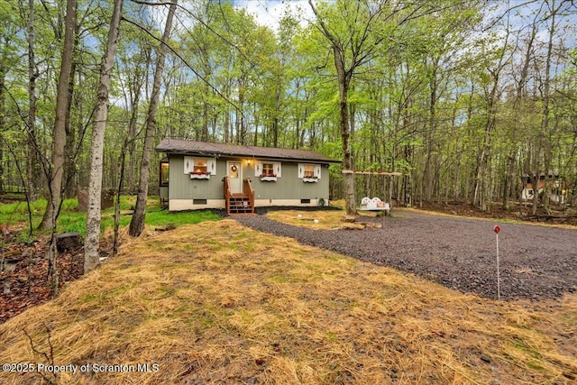 13 S Lehigh River Dr, Clifton Twp, PA 18424 - view of front of house with crawl space and gravel driveway