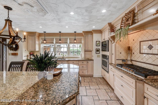 214 Oak St, Dunmore, PA 18512 - kitchen with appliances with stainless steel finishes, stone tile floors, a sink, decorative backsplash, and recessed lighting