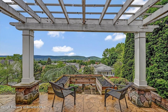 214 Oak St, Dunmore, PA 18512 - view of patio featuring a pergola