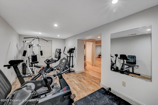 214 Oak St, Dunmore, PA 18512 - workout room with wood finished floors, recessed lighting, and baseboards