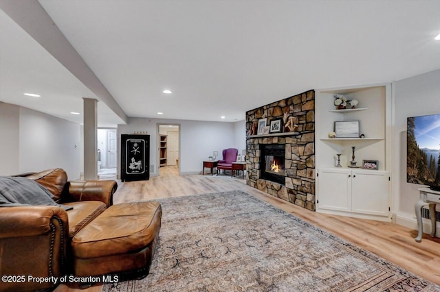 214 Oak St, Dunmore, PA 18512 - living area with light wood finished floors, recessed lighting, a fireplace, and baseboards