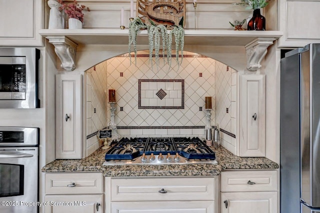 214 Oak St, Dunmore, PA 18512 - kitchen featuring appliances with stainless steel finishes, decorative backsplash, open shelves, and white cabinets
