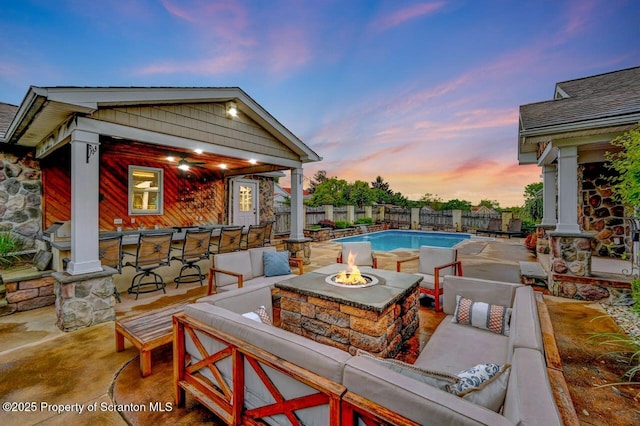 214 Oak St, Dunmore, PA 18512 - view of pool featuring an outdoor living space with a fire pit, a fenced backyard, and a patio area