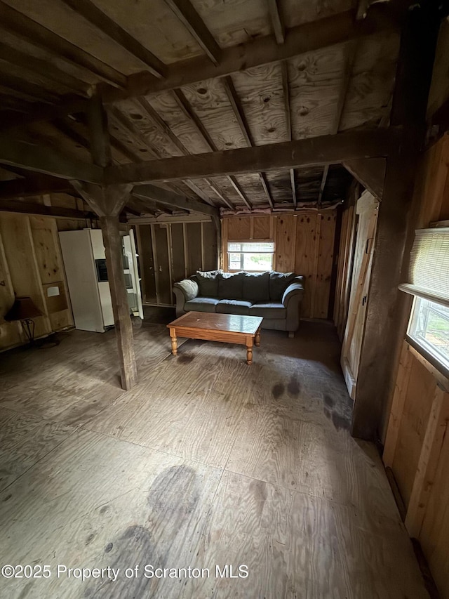 10 Lazy Squaw Trl, Gouldsboro, PA 18424 - living area featuring wood walls and lofted ceiling