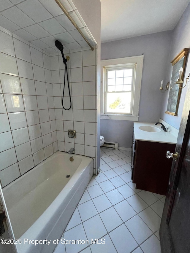 bathroom with vanity, bathtub / shower combination, tile patterned flooring, and toilet