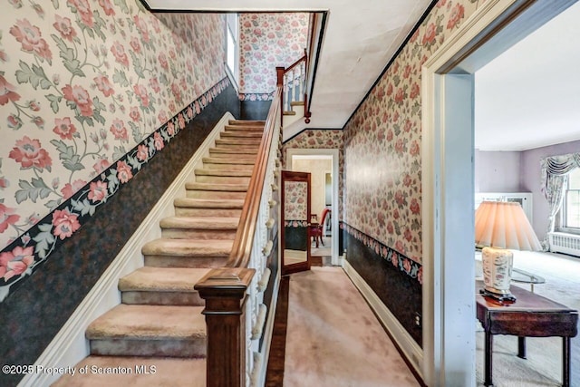 1614 Jefferson Ave, Dunmore, PA 18509 - stairway with wallpapered walls, carpet flooring, and baseboards