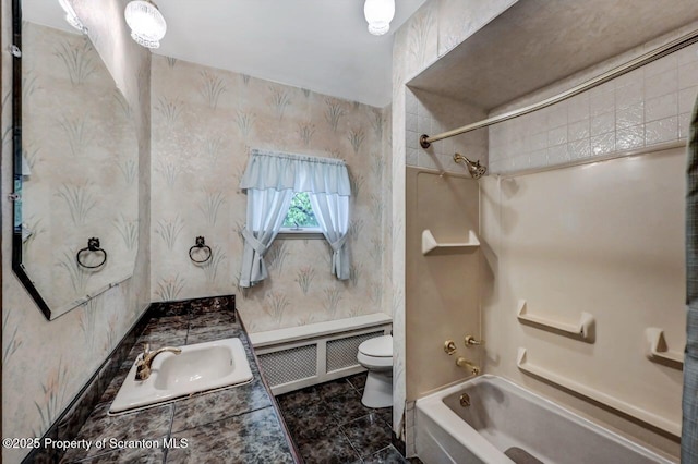 1614 Jefferson Ave, Dunmore, PA 18509 - bathroom featuring radiator, toilet,  shower combination, wallpapered walls, and vanity