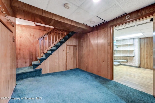 1614 Jefferson Ave, Dunmore, PA 18509 - stairs with a drop ceiling, wooden walls, and carpet floors