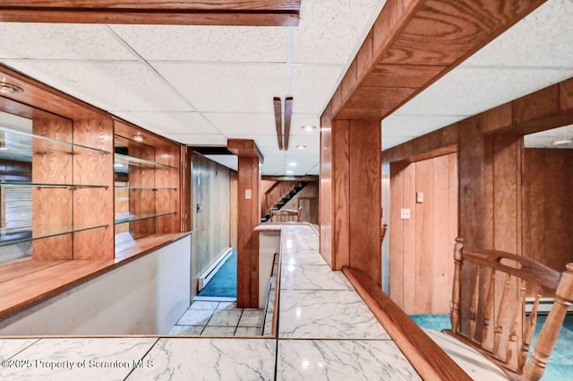 1614 Jefferson Ave, Dunmore, PA 18509 - corridor with marble tiled floors, wooden walls, and stairs