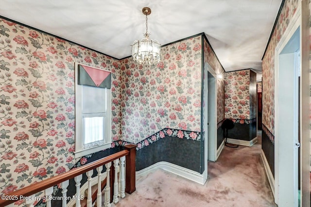 1614 Jefferson Ave, Dunmore, PA 18509 - hall with wallpapered walls, a chandelier, baseboards, and carpet