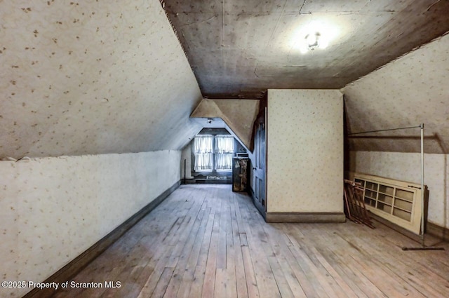 1614 Jefferson Ave, Dunmore, PA 18509 - additional living space with wood-type flooring, lofted ceiling, and baseboards