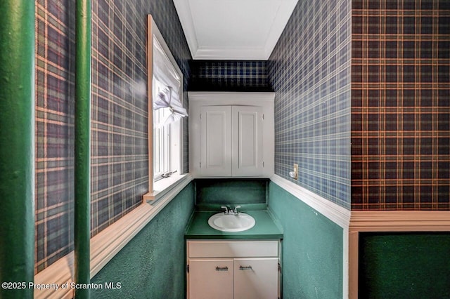 1614 Jefferson Ave, Dunmore, PA 18509 - bathroom featuring ornamental molding, wallpapered walls, and vanity