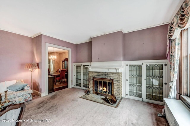 1614 Jefferson Ave, Dunmore, PA 18509 - living room with carpet flooring, a chandelier, crown molding, a fireplace, and baseboards