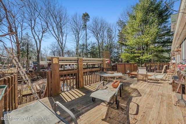 2119 Vacation Ln, Pocono Summit, PA 18346 - wooden deck with outdoor dining space