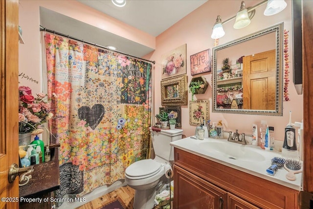 2119 Vacation Ln, Pocono Summit, PA 18346 - bathroom with toilet, vanity, and curtained shower