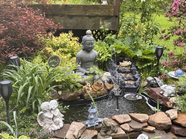 2119 Vacation Ln, Pocono Summit, PA 18346 - exterior view of a garden pond