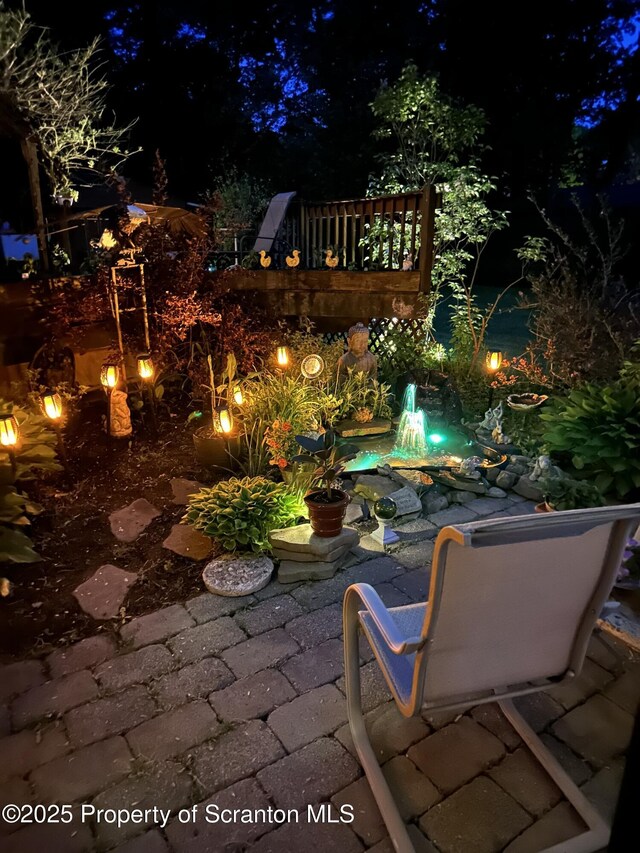 2119 Vacation Ln, Pocono Summit, PA 18346 - view of patio at night
