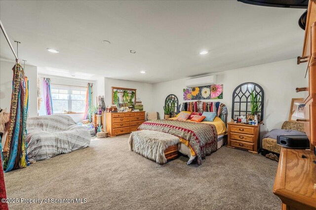 2119 Vacation Ln, Pocono Summit, PA 18346 - carpeted bedroom featuring a wall mounted air conditioner and recessed lighting