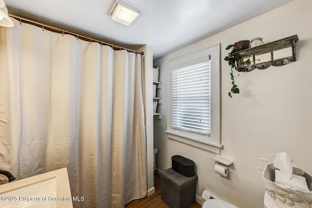 bathroom featuring sink and walk in shower