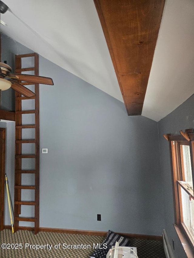 bonus room featuring baseboard heating, lofted ceiling, and carpet floors