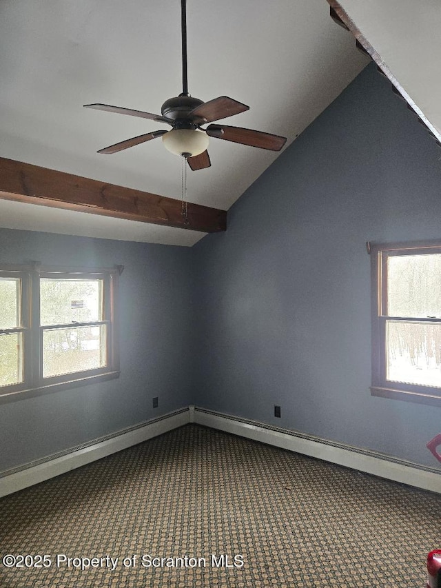 carpeted spare room with vaulted ceiling and ceiling fan