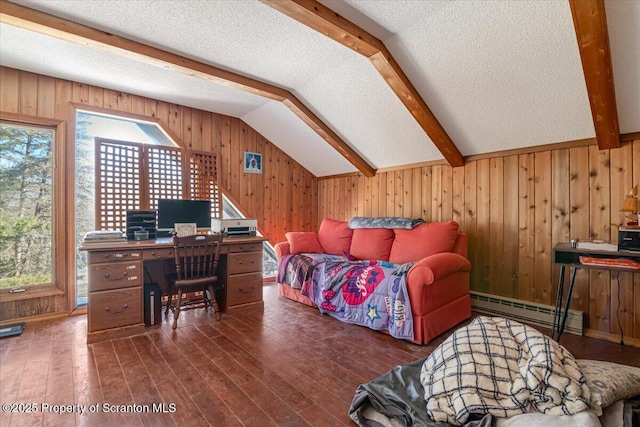 bedroom featuring wooden walls, a baseboard radiator, dark hardwood / wood-style flooring, and a textured ceiling