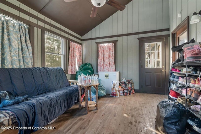 interior space with vaulted ceiling and ceiling fan