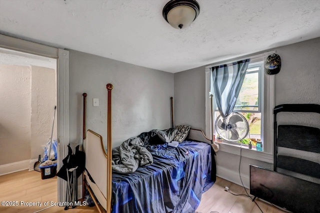 612 Farber Ct, Scranton, PA 18510 - bedroom featuring wood finished floors and baseboards