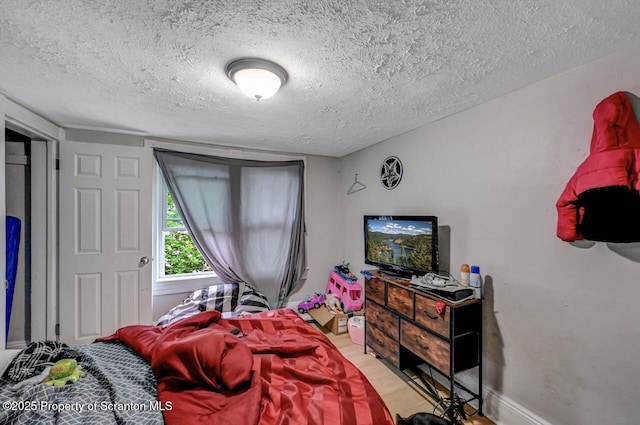 612 Farber Ct, Scranton, PA 18510 - bedroom with a textured ceiling