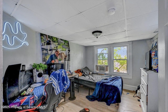 612 Farber Ct, Scranton, PA 18510 - bedroom featuring wood finished floors, a paneled ceiling, and cooling unit