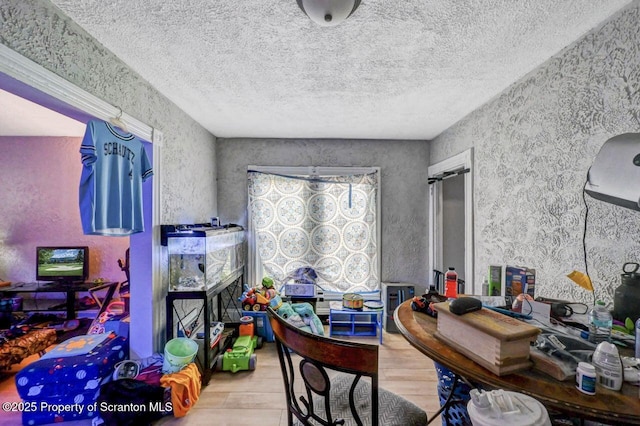 612 Farber Ct, Scranton, PA 18510 - dining space with wood finished floors and a textured ceiling